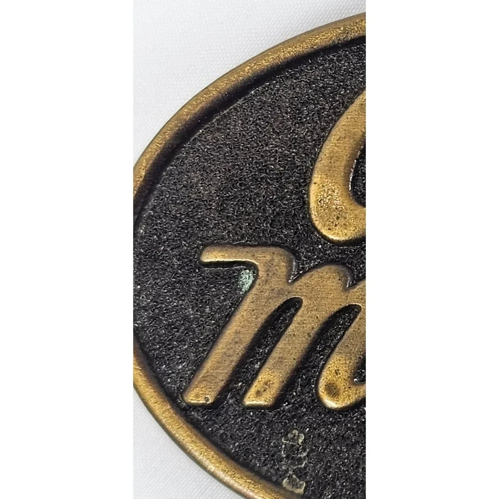 Vintage 1977 Carnation Calf Manna Solid‎ Brass Belt Buckle Award Design